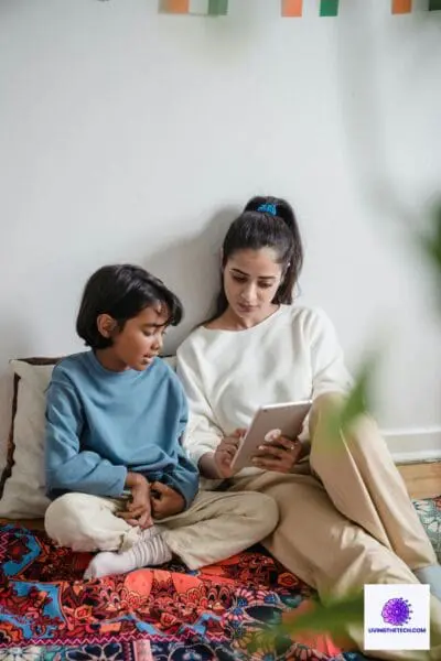 Mother helping her child use a tablet safely, representing digital parenting advice in a modern tech environment
