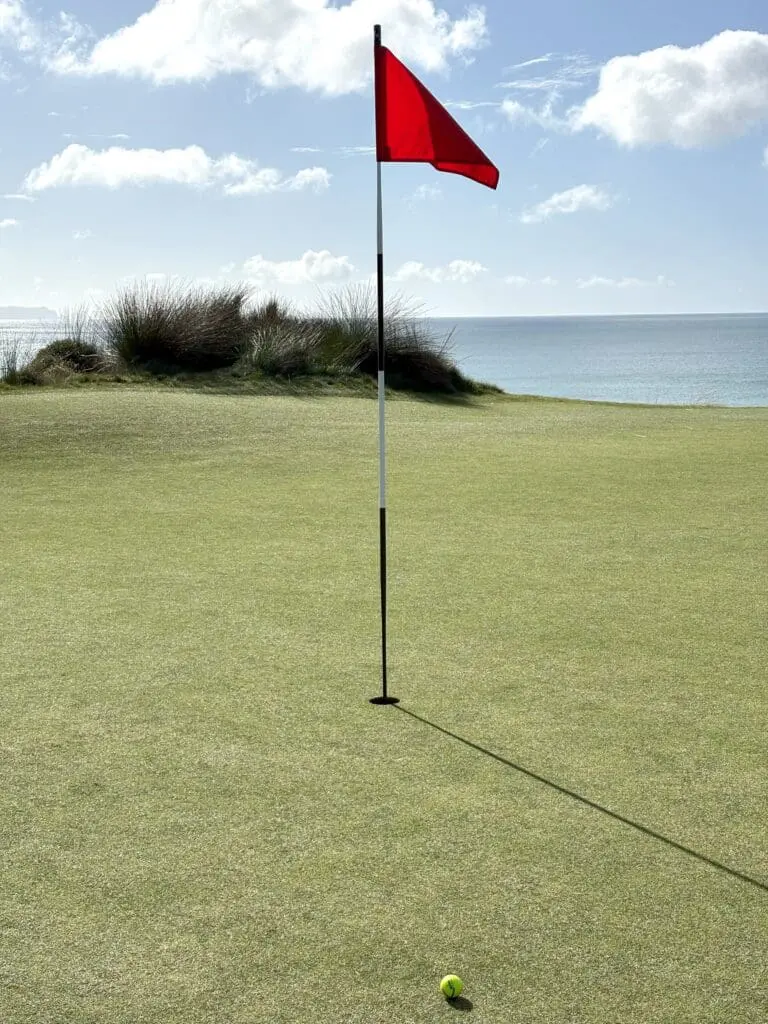 View of Te Arai Golf Course in New Zealand featuring lush fairways, coastal dunes, with stunning views over the Pacific Ocean