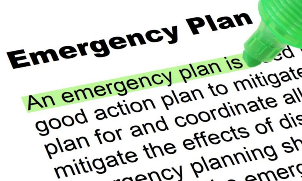Business professionals developing a disaster recovery strategy and continuity plan