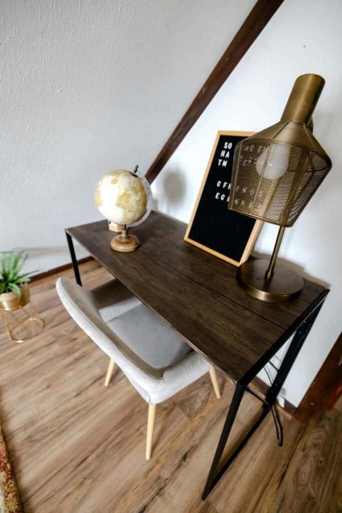 3 Brilliant Hacks for the Perfect Dual-Purpose Home Office Modern dual-purpose home office with multifunctional furniture, combining workspace and guest room design